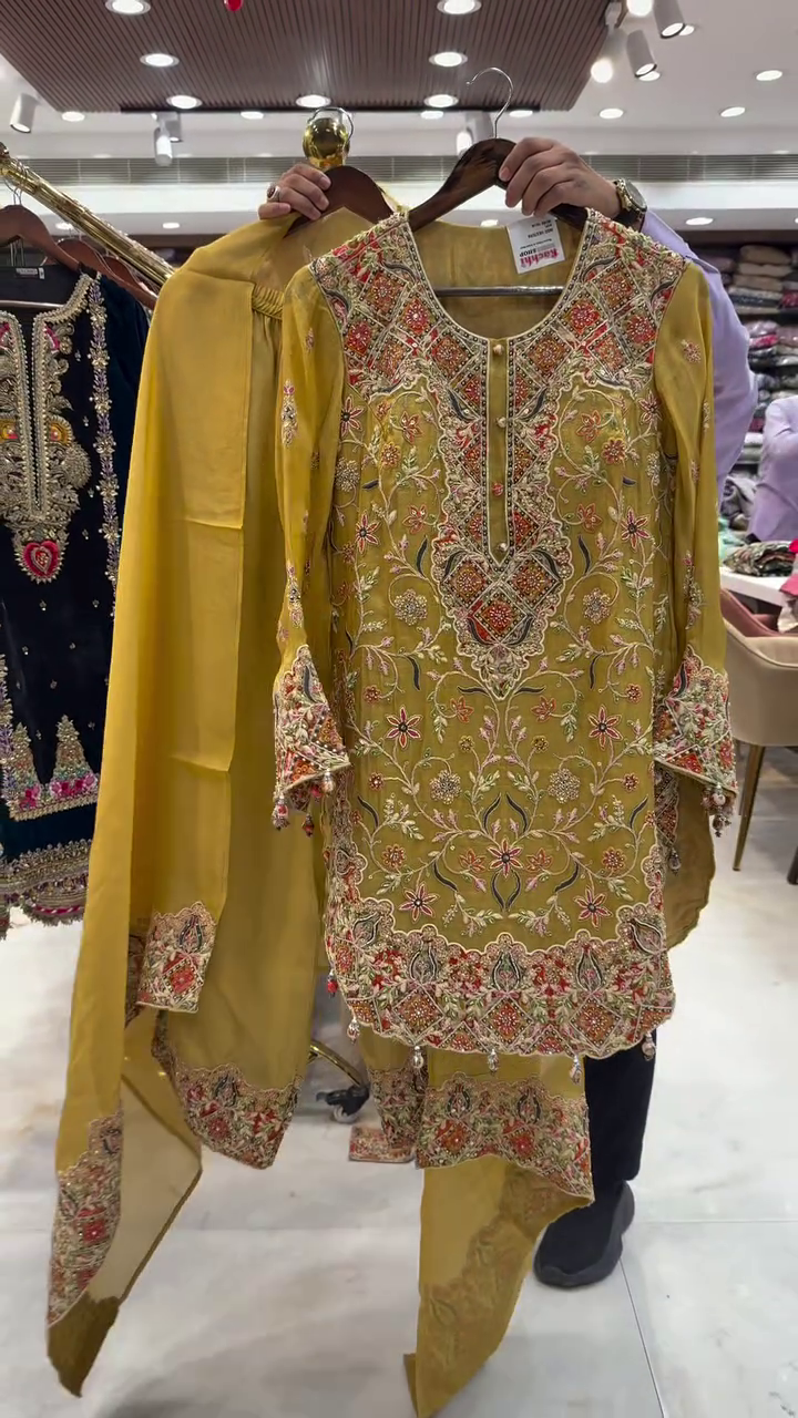 Ivory Multi-Color Heavy Embroidered Festive Suit