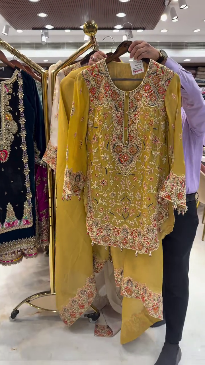 Ivory Multi-Color Heavy Embroidered Festive Suit