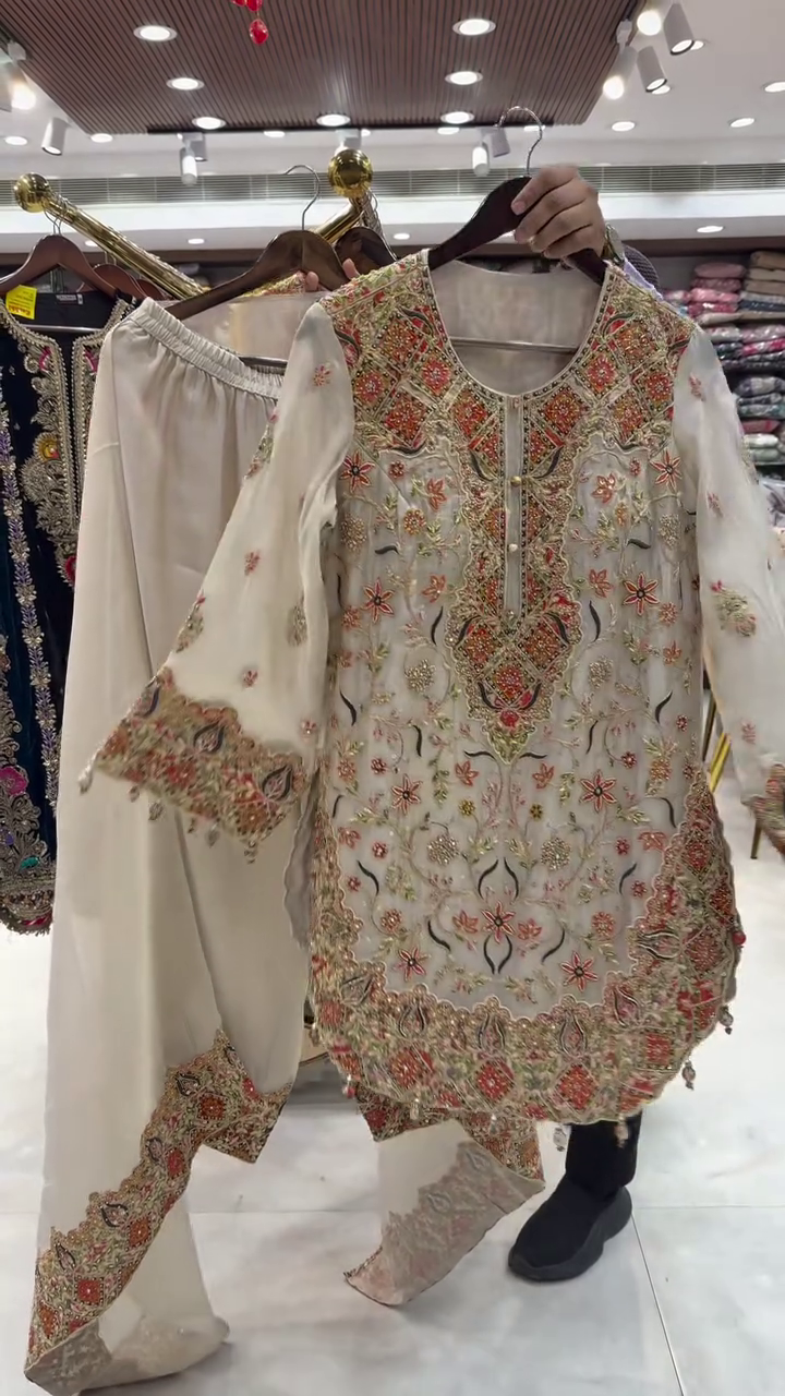 Ivory Multi-Color Heavy Embroidered Festive Suit