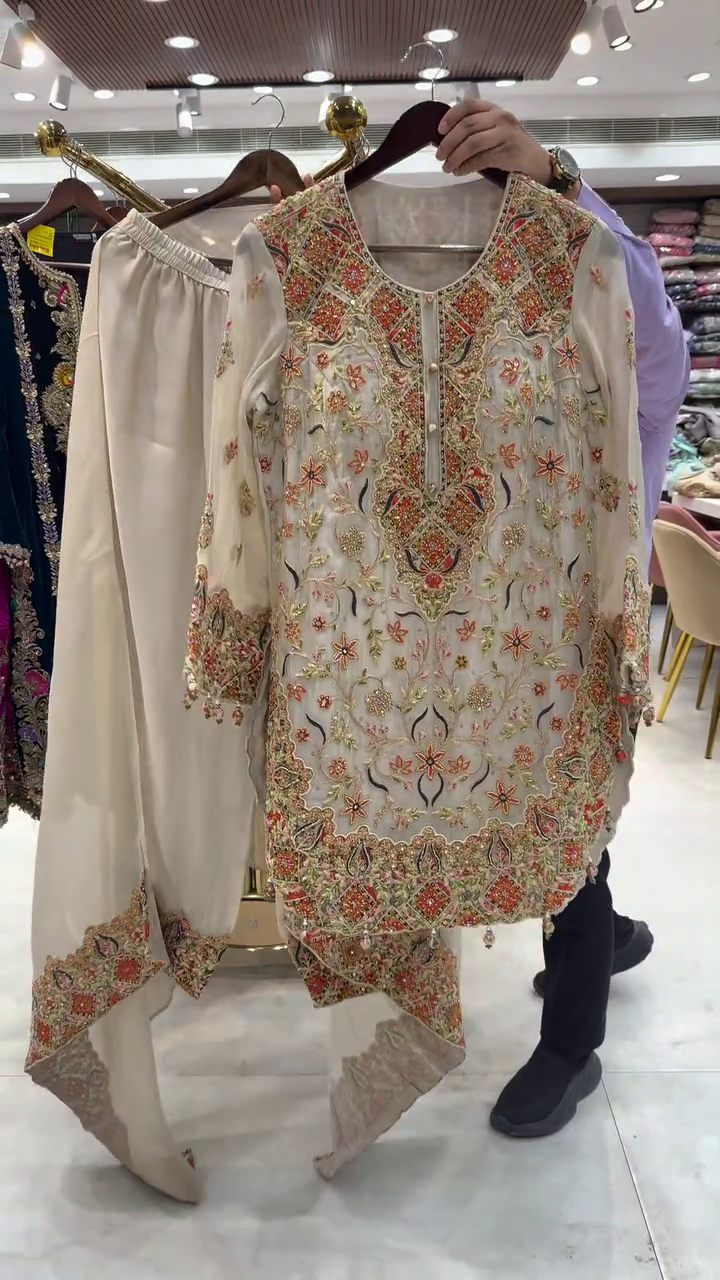 Ivory Multi-Color Heavy Embroidered Festive Suit